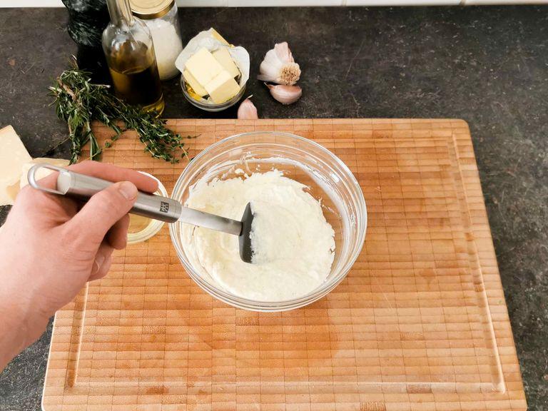 Grate the Parmesan. Separate the egg white from the egg yolk with the remaining egg, and set aside the egg white. Mix egg yolk with the Parmesan and ricotta. Zest the lemon over the bowl then add some lemon juice, too. Season to taste with salt and pepper.