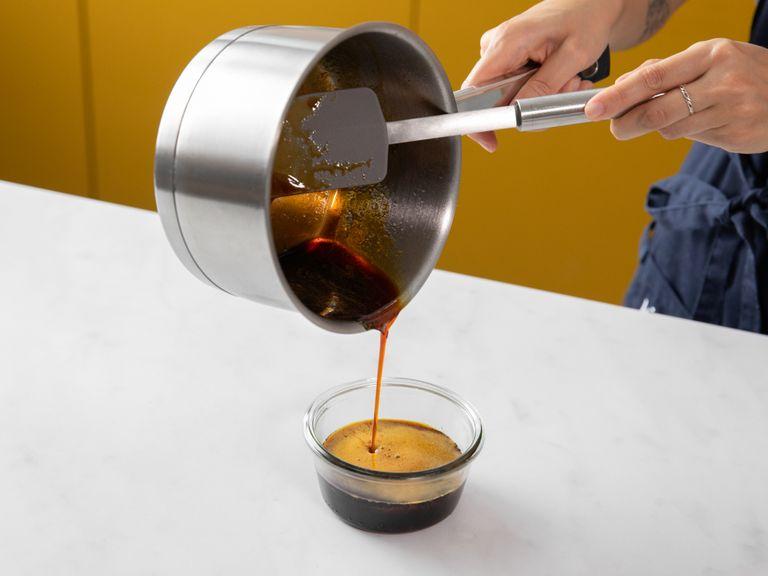 Return the saucepan to the stove and stir over medium-low heat until water is mixed into the caramel. Remove from the heat and let cool, then transfer to a resealable glass jar and add approx. 2 tbsp. of caramel sauce to a large bowl.