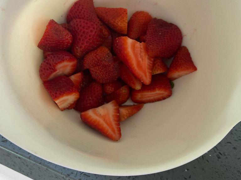Pour the strawberries into a bowl