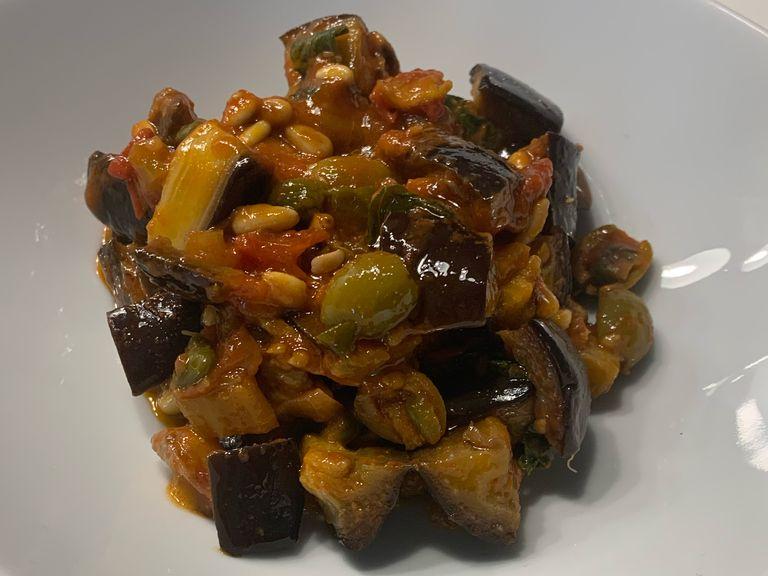 Caponata is a dish to be served at room temperature, so store it in the fridge for some hours (ideally overnight as the dish will taste better the next day!).