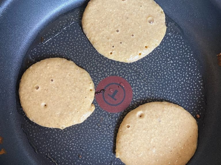 Spread coconut oil to the pan before frying each pancake. Use a ladle to count the portion for each pancake. Wait 1 min max and carefully flip the pancake using a spatula. Repeat until the mixture is finished.