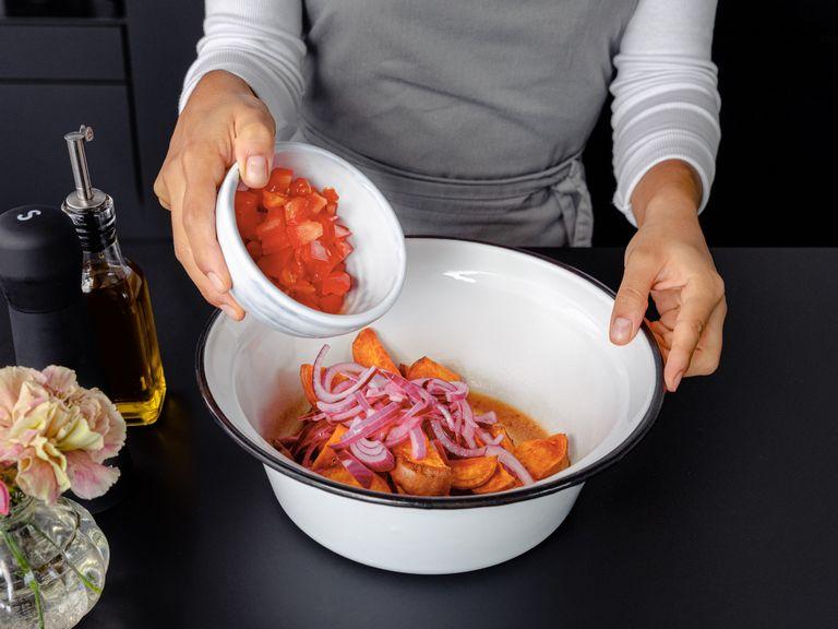 Add remaining lemon juice, tamarind paste, chilli flakes, maple syrup, olive oil, and salt to a large bowl. Whisk to combine and adjust the taste as needed. Add roasted sweet potatoes, drained pickled onions, and tomatoes to the bowl and toss lightly to combine.