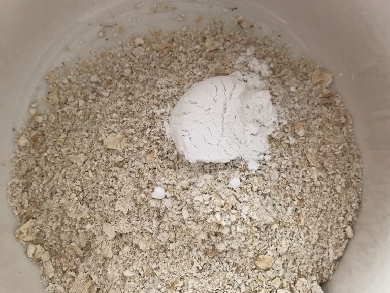 Blend oats in a food processor until they become a fine powder and add baking powder.
