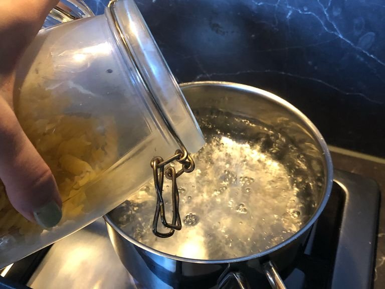 Start boiling pasta water, once the water is boiling add some salt then put in the pasta