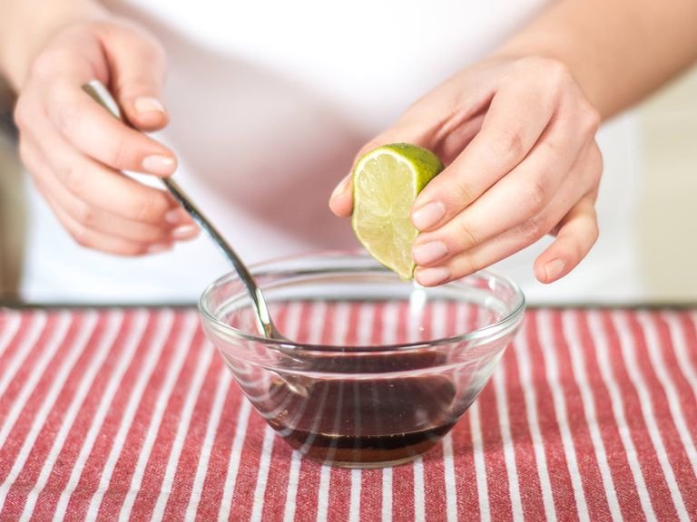 Mix fish sauce, soy sauce, brown sugar, and lime juice together in a small bowl.