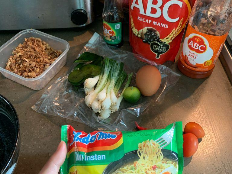 Prepare the ingredients. For the noodles, my favourite is Indomie Soto flavour. You can find this easily in Asian shop nearby. I found many of these abroad when I was traveling, even in Europe. You can substitute with any other instant noodles soup but the taste would be different.