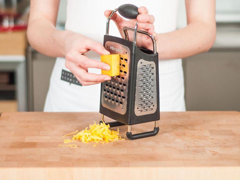 Preheat the oven to 180°C/350°F. Roughly grate cheese using a box grater.