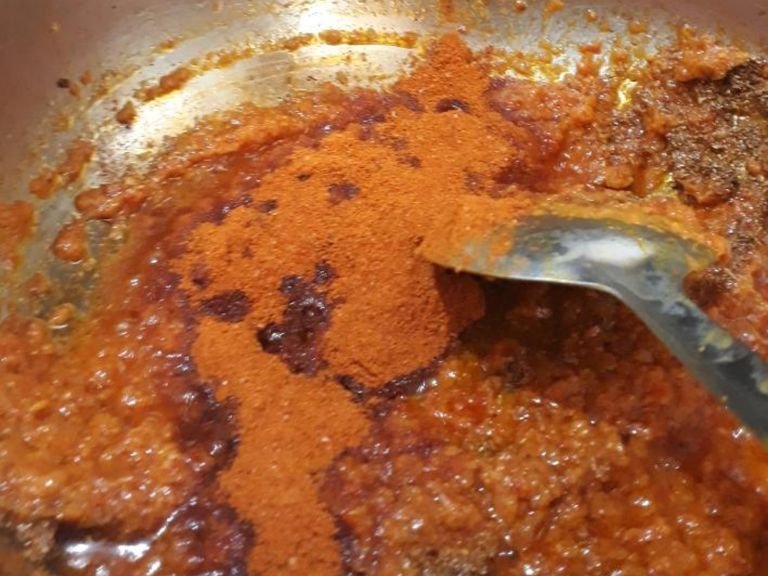 add remaing 1 tsp red chilly powder and 1tbsp coriander powder, 1 tsp turmeric powder,1tsp salt stir well.. pour some water n let it be cooked for 2 minutes