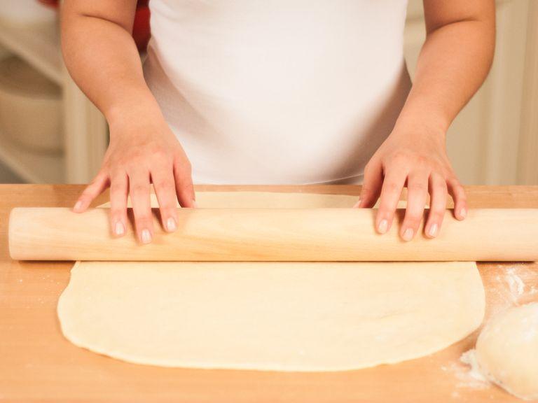Preheat oven to 190⁰C/375⁰F. Halve the dough and roll each half into the shape of a rectangle, approx. 3 mm thick.