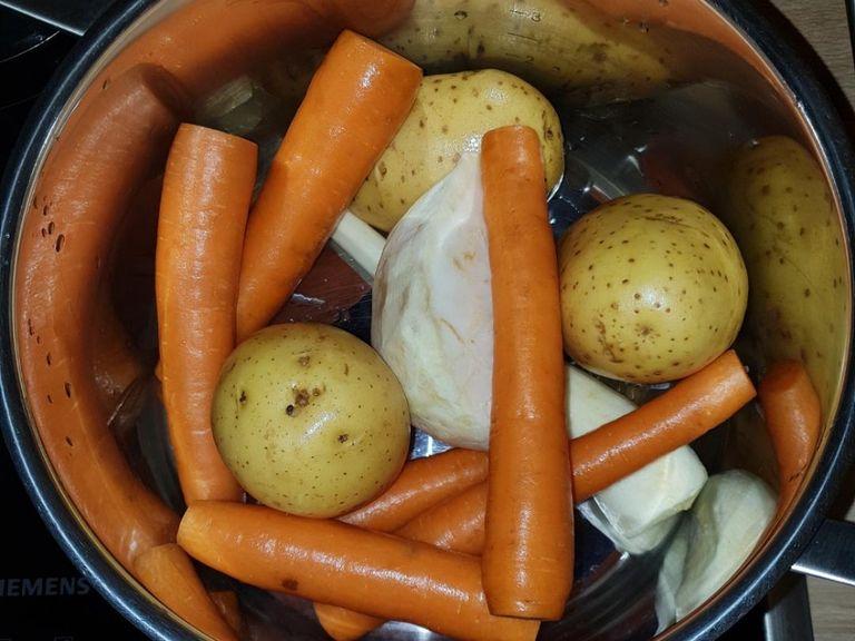 Put all the vegetables in a pot. I like to keep the potatoes and carrots unpeeled but feel free to also peel them if you like. Add just enough water to cover the vegetables, some salt, and boil until all are soft.