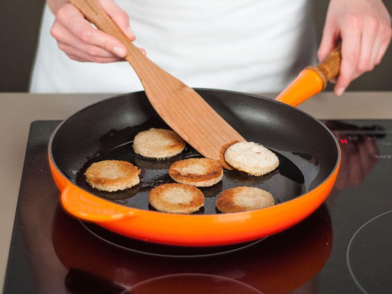 In a frying pan, sauté bread rounds in butter over medium heat for approx. 1 - 2 min. per side until golden brown.