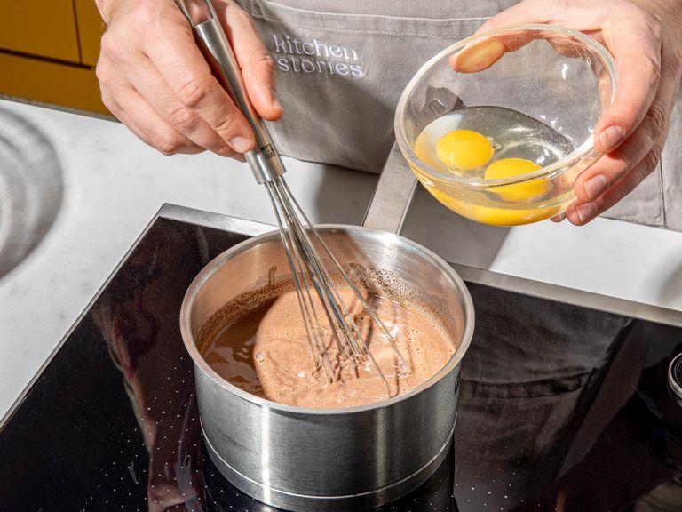 Add milk, butter, and bittersweet chocolate to a saucepan. Set over medium heat and whisk constantly until melted. Whisk in eggs once the chocolate milk has cooled slightly. In a large bowl, sift cocoa powder and flour. Add sugar, baking powder, and salt and mix to combine. Add wet ingredients to the bowl and mix well to form a lump-free batter. Place waffle iron on a board or baking sheet to catch any spills and let preheat.