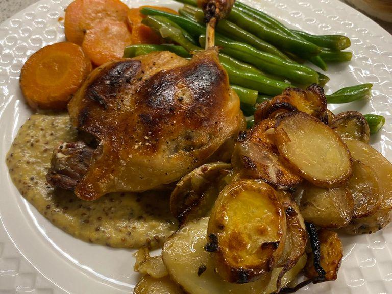 I made a Dijon cream sauce (Dijon, whole grain mustard and a bit of cream, warmed for a couple mins and finished with half Tbs of butter) to serve with the duck and blanched string beans tossed in duck fat. It would also be great with a sharp vinaigrette salad.