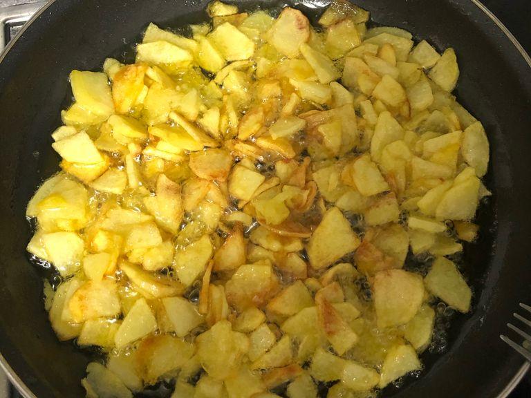 After 20 minutes, the potatoes should look this way. I personally love when some potatoes are a bit toasted.