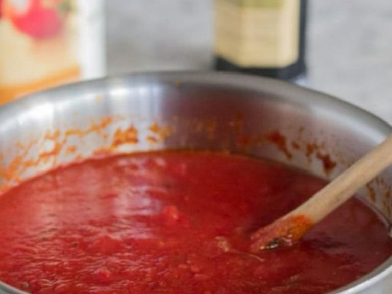 In a separate pan, add olive oil, and one minced garlic clove and tomato paste, cook for a few minutes then add your tomato Passata. season with salt and pepper.