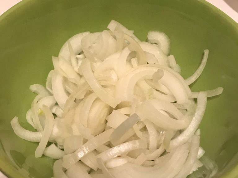 Cut the onions and add them into a bowl