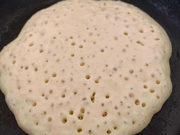 On mid to low heat in a fry pan add cooking oil. When hot add a scoop of pancake batter in the fry pan. Fill when you start seeing bubble at the top and cook on the other side for 2mins