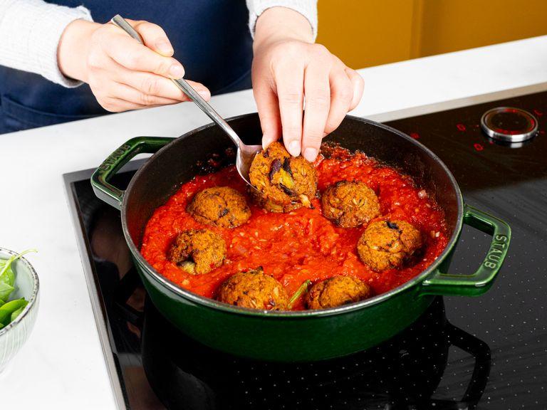 Bake at 200°C/400°F for approx. 20 min. or until lightly browned and crisp on the outside. Add half of the basil leaves to the tomato sauce, then add the meatballs and lightly toss. Serve with remaining basil and enjoy!