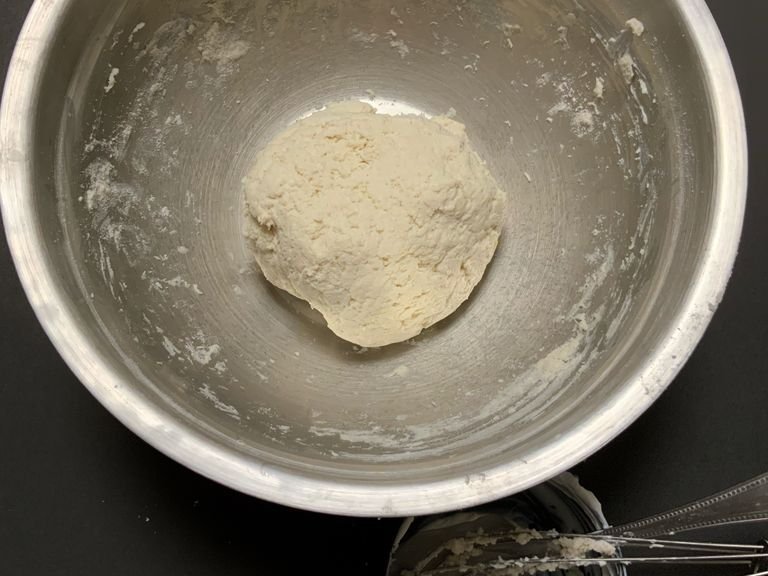 Until form a dough ball
