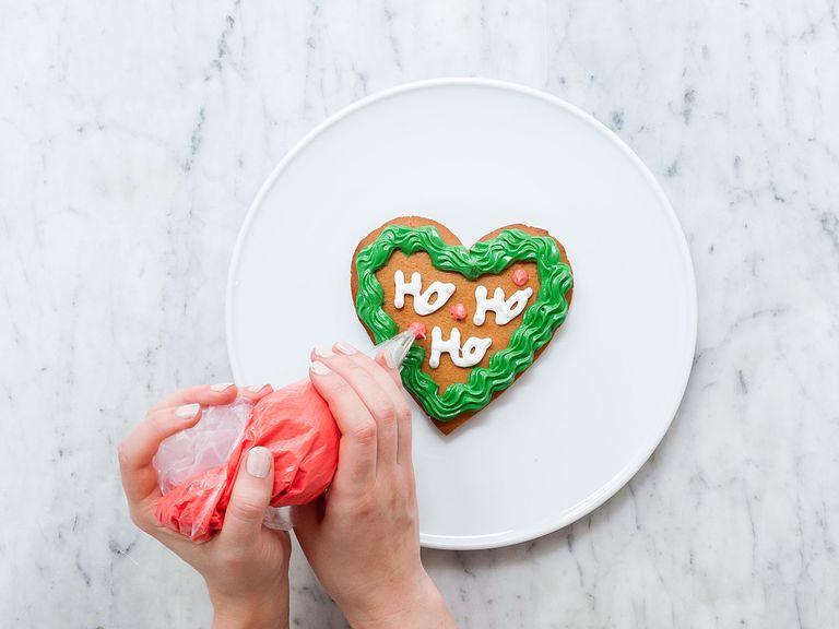 Transfer all three icings into separate piping bags with tips. Decorate gingerbread hearts as desired and enjoy for yourself or as a gift!