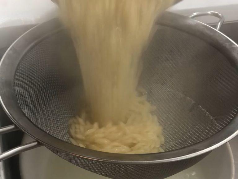 Drain the Orzo and save some of the pasta water