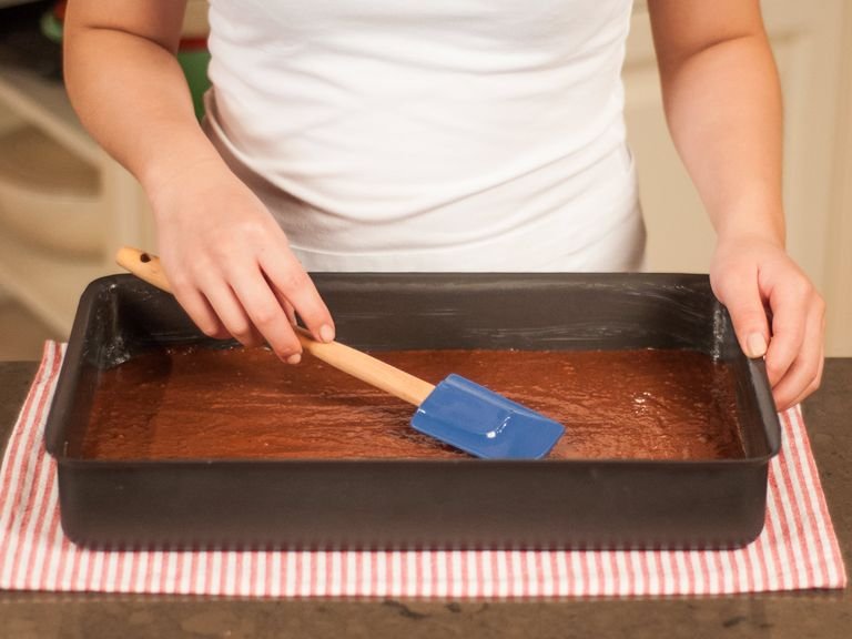 Transfer batter to a greased baking pan. Spread evenly and gently knock pan on work surface to release air bubbles. Bake in a preheated oven at 180°C/350°F for approx. 25 min. until a toothpick inserted comes out clean. Set aside to cool.