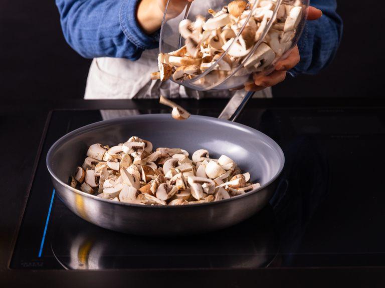 Add some butter to a frying pan over medium-high heat. Once butter is melted, add mushrooms and sauté for approx. 6 min. Add remaining rosemary and let cook for another minute. Add heavy cream, then let it reduce for approx 5 min. Stir in some more butter and season with salt and pepper.