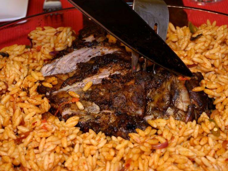 Evenly slice the lamb shoulder and serve with the Orzo pasta.