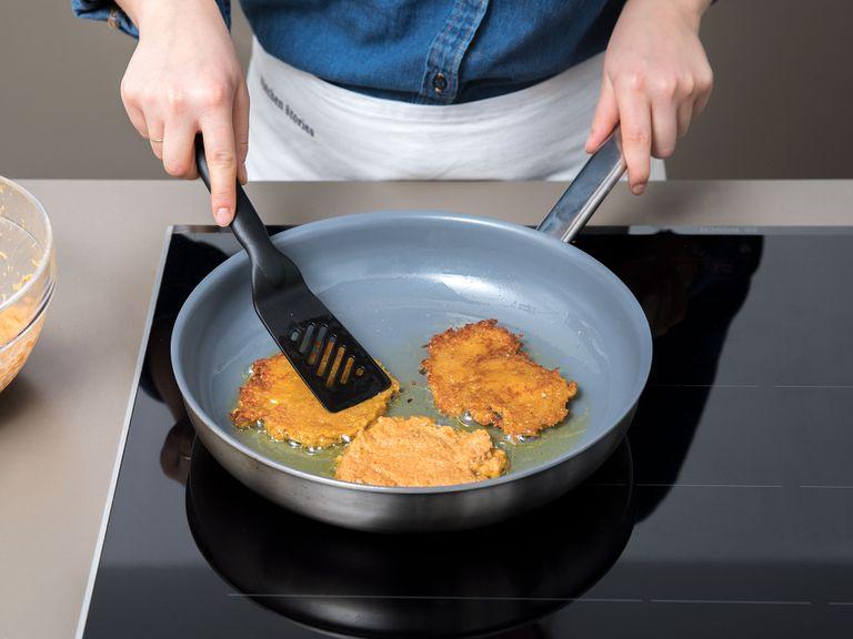 Heat sunflower oil in a larger pan. Add in spoonfuls of sweet potato mixture and fry in batches, pressing them flat, and frying on both sides until golden brown. Repeat until mixture is used up.