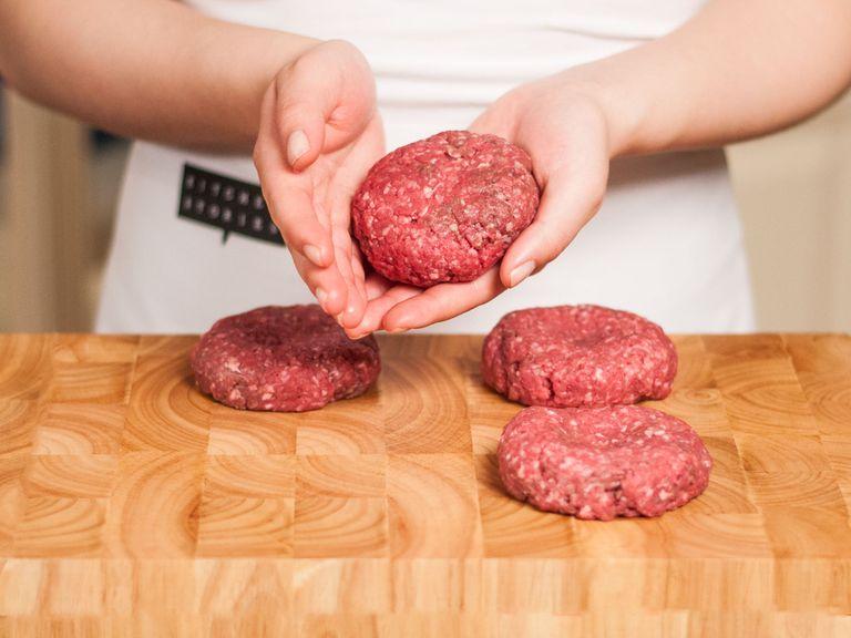 Season ground beef with some pepper to taste and form into burger patties with damp hands. Create a small well in the middle to prevent the burger from puffing up during cooking.
