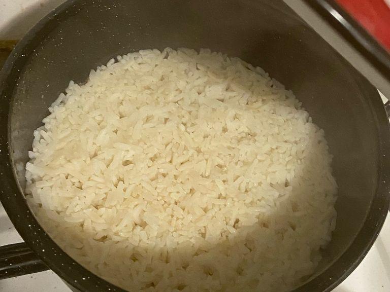 Boil rice to serve the curry with