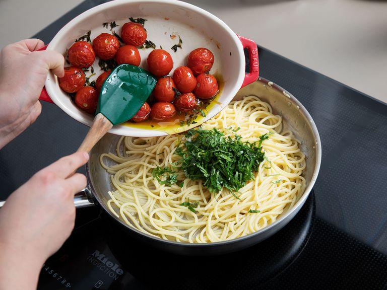 Drain the spaghetti and remove tomatoes from oven. Melt the remaining butter in pan set over medium heat, add the minced garlic and fry for approx. 1 min. Add spaghetti and tomatoes and toss to combine. Season with salt and pepper. Tear mozzarella and scatter over the spaghetti, followed by the pine nuts and basil. Enjoy!