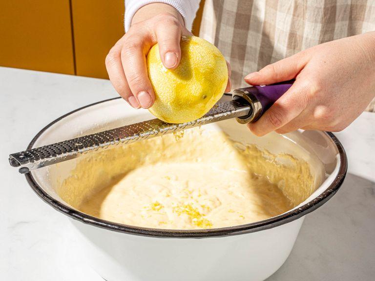 In a large bowl, combine buttermilk, eggs, vanilla extract, and two-thirds of the melted butter. Whisk to combine. Then add flour, sugar, baking powder, lemon zest, and salt. Fold ingredients in until well combined. Warm up jam and set aside.