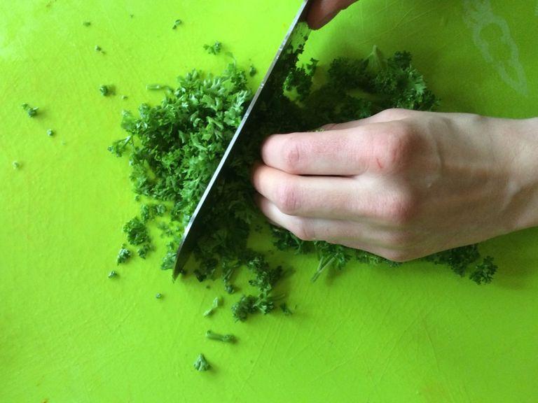Finely chop parsley.