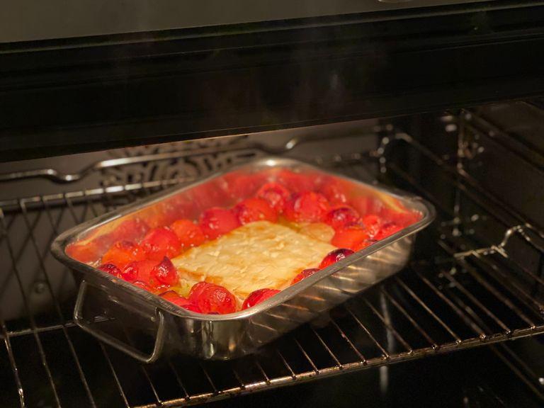Take you baking tray from the oven and add a dash of pasta water from your cooking pasta. Mix the mixture crushing your tomato’s to prepare your sauce.