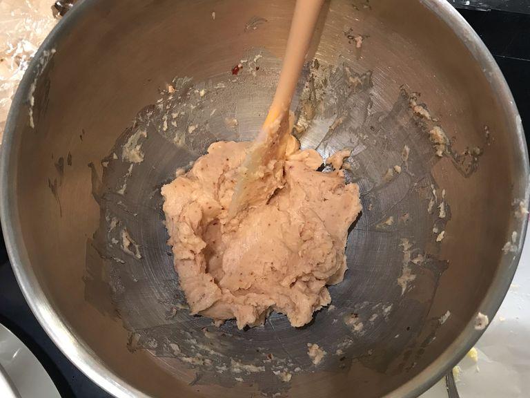For the strawberry buttercream, add the strawberry reduction to the bowl with the reserved buttercream. Continue whipping until incorporated.