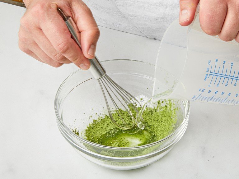 In the meantime, mix the matcha powder with half of the water in a small bowl to make a paste. Gradually stir in the remaining water until everything is well mixed and dissolved. Set aside.