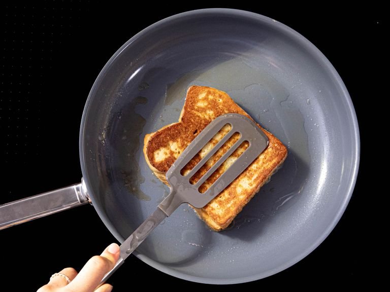 Heat clarified butter in a frying pan over medium-low heat. Once melted, add one peanut butter sandwich and fry until golden brown, approx. 2 – 3 min. on both sides. Serve with maple syrup. Enjoy!