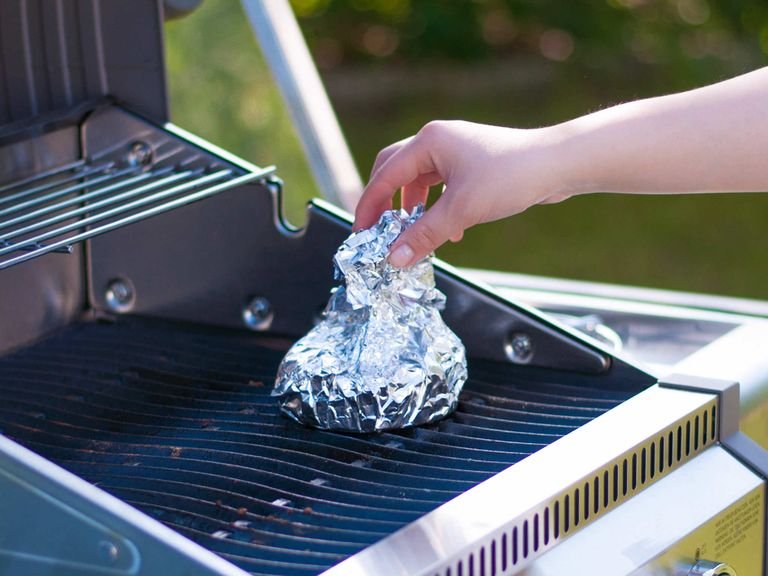 Wrap the foil around the cheese to form a firm parcel and place it onto the grill. Grill for approx. 15 – 20 min. until the cheese is soft.