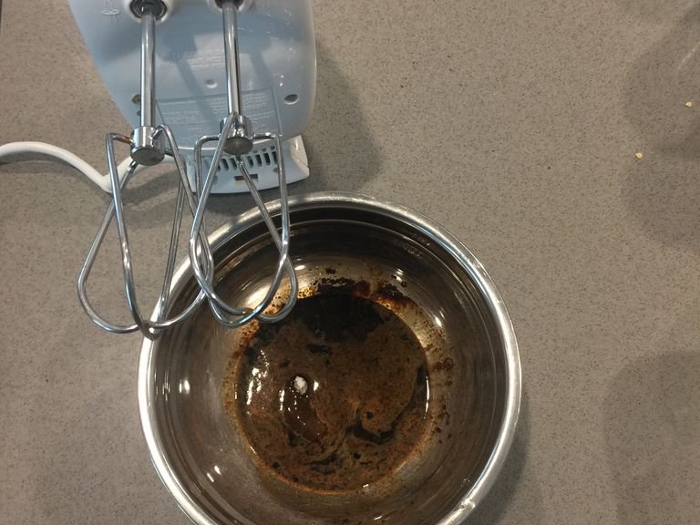 whisk together instant coffee, water, and sugar into a bowl