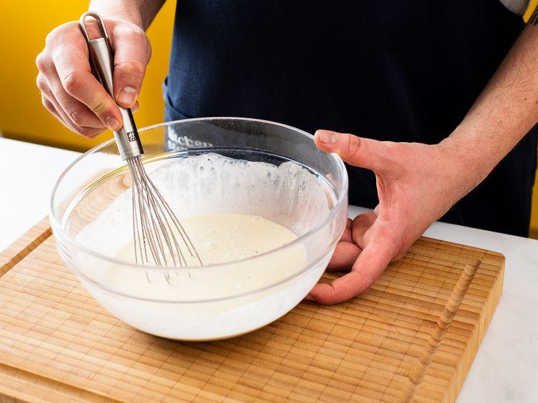 In a mixing bowl, whisk eggs with cream, sour cream, salt, caraway and pepper.