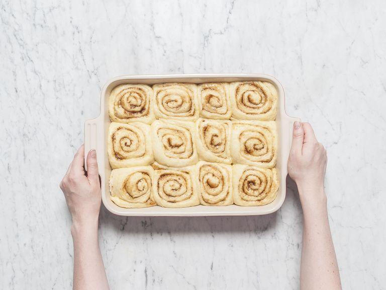 In the meantime, preheat oven to 170°C/350°F. Bake cinnamon buns for approx. 25 min., or until golden brown. Remove from oven and let cool for approx. 10 min.