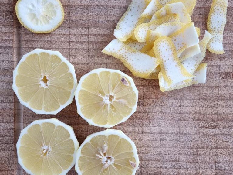 Cut the peel off of some of the lemons and finely grate the Parmesan cheese.