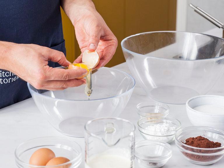Separate egg whites from egg yolks. Beat the egg whites until stiff peaks form. Then whisk in egg yolks, sugar, vanilla sugar, and cocoa powder into the chocolate butter until just combined. Fold in the egg whites.