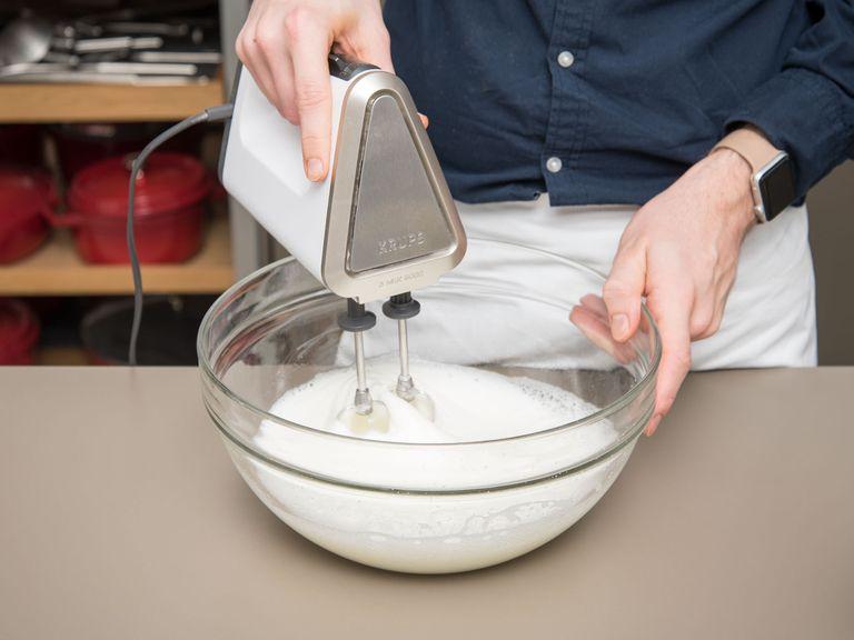 Mix egg whites, sugar, and salt and beat until stiff in a large bowl.