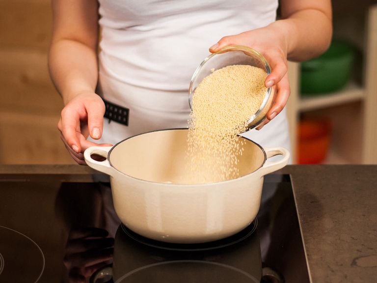 Allow couscous to stand and cook in boiled water, according to package instructions, and set aside.