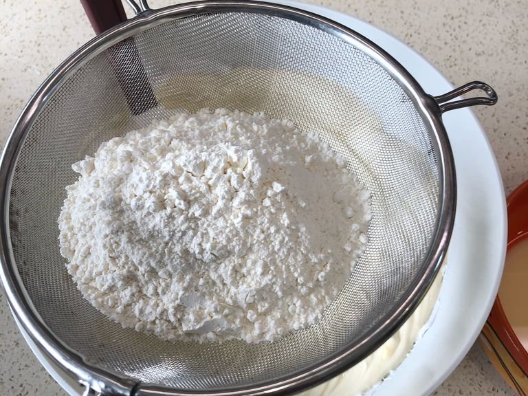 Swift in flour and fold carefully, don’t break the egg whites!