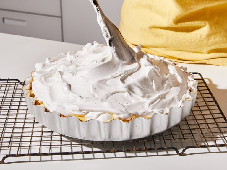 Turn oven to 170°C/340°F. To make the meringue, combine remaining cornstarch and sugar. Add the egg whites to the bowl of a stand mixer fitted with a whisk. Beat on high until soft peaks form, then gradually add in the sugar mixture whisking in between until very stiff and glossy. Pour the lemon filling into the cooled pie shell. Add meringue on top with a spatula, smoothing into a peak. Transfer to the oven and bake for approx. 15 min., or until the meringue is very lightly browned in places. Turn off the oven, and leave the door open to let it cool down slowly. Then, take out and bring to room temperature. Slice, serve, and enjoy!