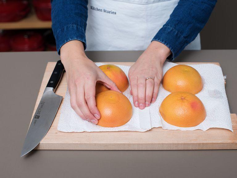 Preheat the broiler on high. Halve grapefruits. Trim 1.25-cm/0.5-inch from the bottom of each grapefruit half to stabilize it, if necessary. Score the segments to loosen for easier eating. Place the halves cut side-down on paper towel to dry for approx. 5 min.