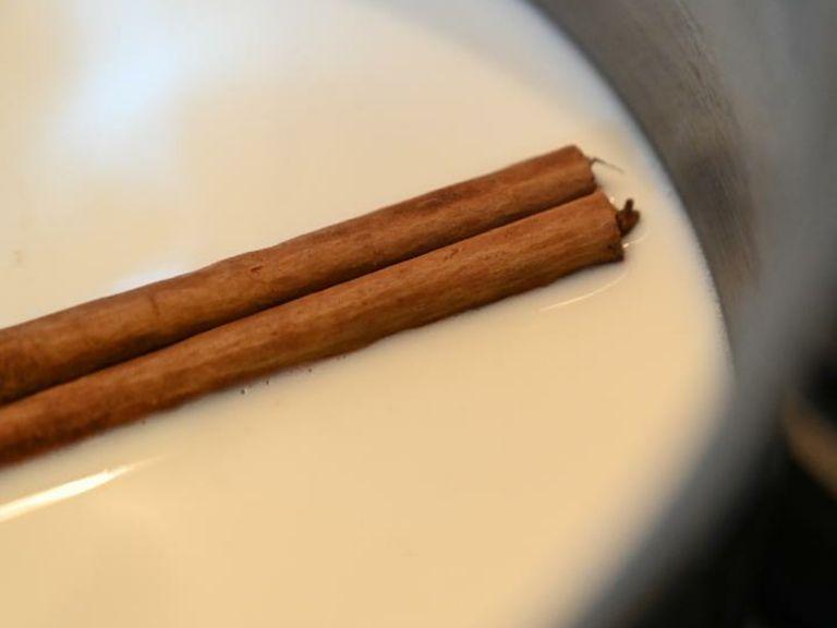 Place the cinnamon stick and milk in a pan and bring to boil. Turn off the heat and leave to infuse for 5 minutes.